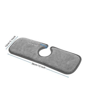 May include: A gray microfiber sink mat, 15 inches long, 5.1 inches wide, and 0.39 inches thick. The mat has a curved cutout for the faucet and is designed to protect the countertop from water damage.