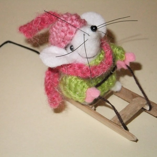 small felt mouse with warm woolies and sledge