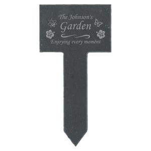 May include: Black slate garden marker with the text "The Johnson's Garden Enjoying every moment" and a bee, butterfly, and flower designs.