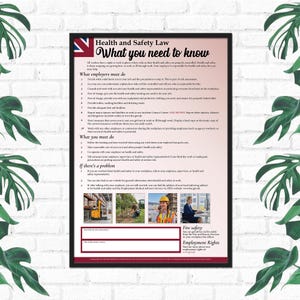 May include: A framed poster titled "Health and Safety Law: What you need to know." The poster includes text about employer and employee responsibilities, with images of workers. The UK flag is in the upper left corner.