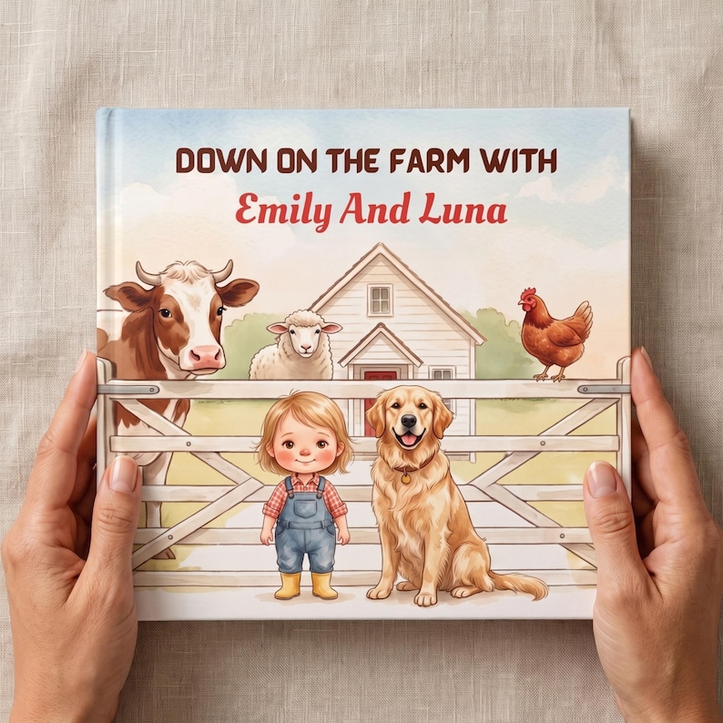 K&ouml;nnte beinhalten: Ein Kinderbuch mit festem Einband mit dem Titel DOWN ON THE FARM WITH Emily And Luna. Das Titelbild zeigt ein Kind und einen Golden Retriever vor einem wei&szlig;en Farmzaun, mit einer Kuh, einem Schaf, einem Huhn und einem Bauernhaus im Hintergrund.