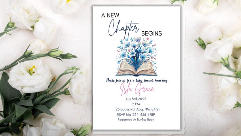 May include: Baby shower invitation with the text "A New Chapter Begins" and "Isla Grace". The invitation features an open book with blue floral arrangements. White flowers surround the invitation.