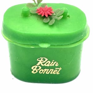Vintage 1960-tals regnhatt blomkrukafodral tillverkat i Hong Kong handväska accessoar