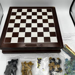 Juego de madera 15 en 1: ajedrez, damas, backgammon, mancala y damas chinas. Tal cual.