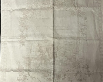 Toalla antigua de lino damasco con escena pastoral tejida, carro de granja figurativo y borde floral.