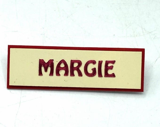 Vintage Margie Name Tag Pin Plastic Red Cream Art Nouveau Font Brooch