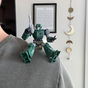 Clipees — magnetic mounts that turn Blokees Transformers figures into a shoulder buddy!