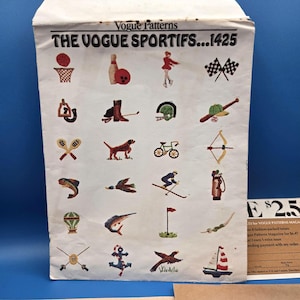 May include: A white paper envelope for Vogue Patterns 1425 titled THE VOGUE SPORTIFS. The front features a grid of twenty small embroidered-style illustrations depicting various sports and leisure activities, including a basketball hoop, bowling pin, bicycle, sailboat, and fishing gear.