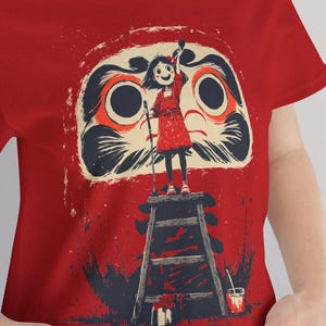 Anime Daruma T-Shirt | Japanese Good Luck Doll Tee | Vibrant Red Art Shirt | Girl with Brush Graphic Tee | Japanese Festival Shirt