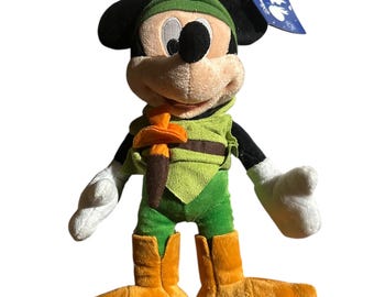 Peluche suave de Mickey Mouse vestido de Peter Pan, oficial de Disney Store, nuevo con etiqueta, 25 cm.