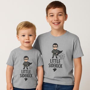 ユース 父と息子のマッチングスーパーヒーローTシャツ、お父さんと子供のグラフィックTシャツ、ファミリーコスチュームシャツ、父の日ギフト、楽しいコミックブックトップ、かわいい親
