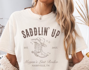 Custom Cowgirl Bride Shirt, Personalized Western Bachelorette Tshirt, Nashville Bach Matching Country Bridal Party Tees, Saddlin Up Shirt