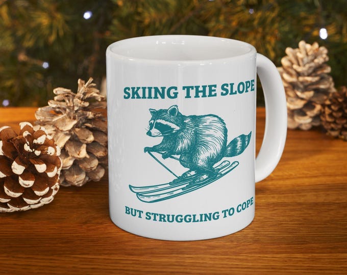 Skiing Raccoon Mug, Skiing The Slope But Struggling to Cope Mug, Funny Skiing Mug