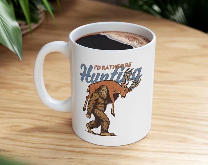 I'd Rather Be Hunting Mug, Bigfoot Hunting Mug Funny Sasquatch Carrying Deer, Rustic Hunter Gift, Sasquatch Cryptid Mug Gift