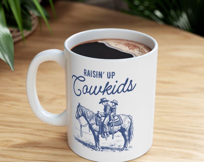 Raisin Up Cowkids Mug, Homesteading Mug, homeschooling Gift, Homeschooling mom, 1000 hours outside, wranglin feral children mug