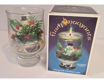 Vela flotante vintage con forma de muñeco de nieve navideño, llama flotante, nueva en caja