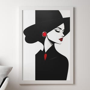 Może przedstawiać: Oprawiony wydruk artystyczny przedstawiający stylizowaną ilustrację kobiety w czarnym kapeluszu i płaszczu. Grafika ma minimalistyczny design z czerwonymi akcentami na kolczykach i krawacie. Usta kobiety są pomalowane na czerwono.