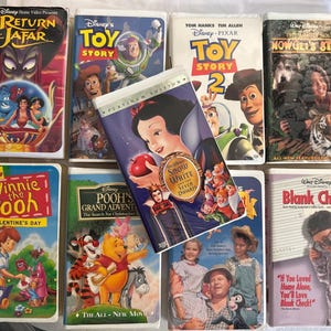 Mix Lot 9-Walt Disney VHS Tapes, Snow White, Toy Story 1 & 2, Winnie Pooh, Jafar
