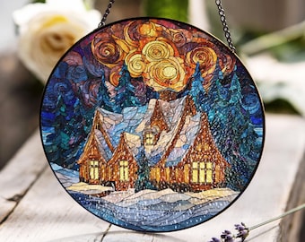 星とクリスマスツリーが描かれた雪のコテージのステンドグラスパネル