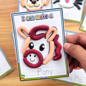 May include: A card with a pony made of clay. The pony has a maroon mane and a light orange face. The card reads "I can make a Pony" with the @crayonbiby logo.