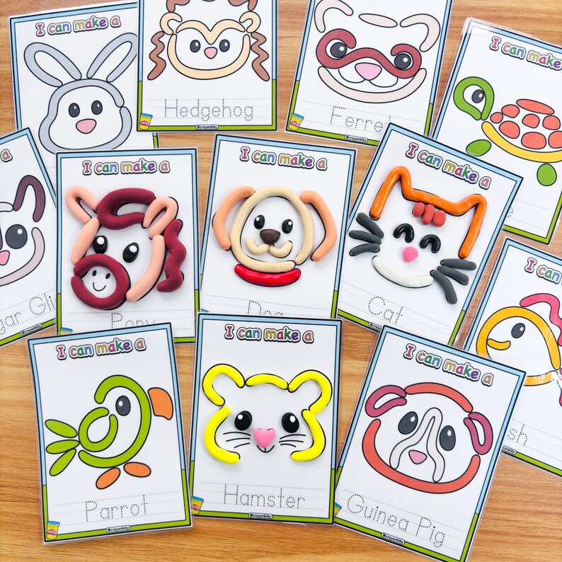 May include: A collection of colorful animal-themed craft cards. Each card features a line drawing of an animal, such as a dog, cat, or hamster, with the words "I can make a" above and the animal's name below.