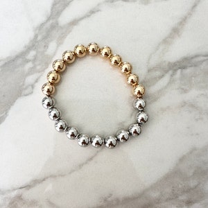 18k goud en gerhodineerd gevulde tweekleurige grote kralenarmband, sierlijke armband