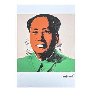 May include: A pop art print depicting a man with orange skin, black hair, and a green jacket. The artwork has a white border and includes a signature and edition number.