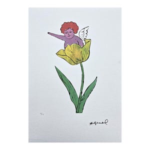May include: A whimsical print featuring a purple cherub with red curly hair and white wings, emerging from a yellow tulip. The artwork has green leaves and stem, with a signature in the bottom right corner. The print is on a white background.