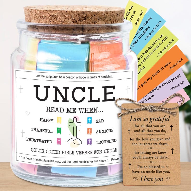 May include: A glass jar with a cork lid filled with colorful Bible verses for an uncle. The jar has a label that reads "UNCLE" and "Read Me When..." with various emotions. A small tag reads "I am so grateful" with a heart and cross.