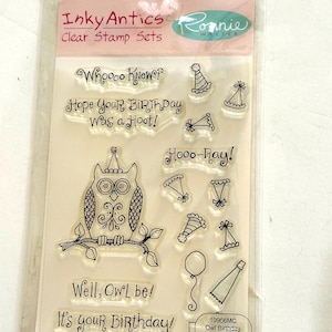 May include: A set of three ceramic mugs with a speckled, matte finish. The mugs are in shades of cream, light gray, and dark gray. Each mug has a simple, minimalist design and a rounded handle.