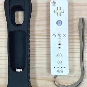 Nintendo Wii Remote White Controller with Black Silicone Cover and MotionPlus Attachment Set Used Untested OEM Gaming Accessory
