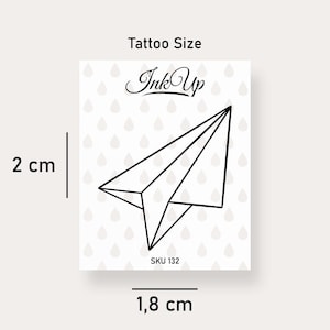 Temporary tattoo paper airplane