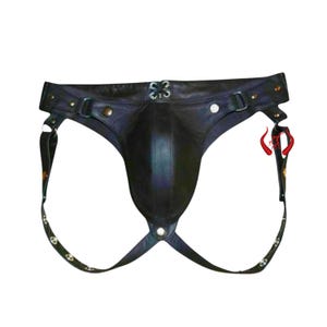 May include: Black leather jockstrap with adjustable straps and metal hardware. The jockstrap features a contoured pouch and decorative rivets. The straps have a skull and crossbones pattern.