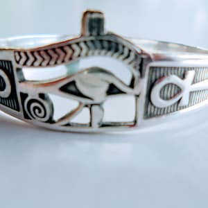 Egyptian Silver Cuff Bracelet or Bangle Depicting the Eye of Horus and Ankh