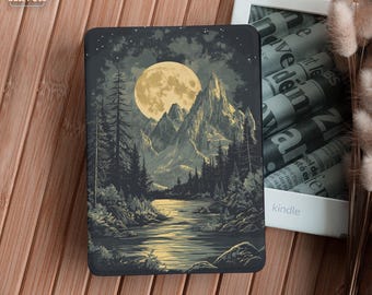 May include: A Kindle cover featuring a landscape illustration with a full moon, mountains, and a river. The cover is dark with a detailed design. The word "Haven" is in the upper left corner. A white Kindle is next to the cover.