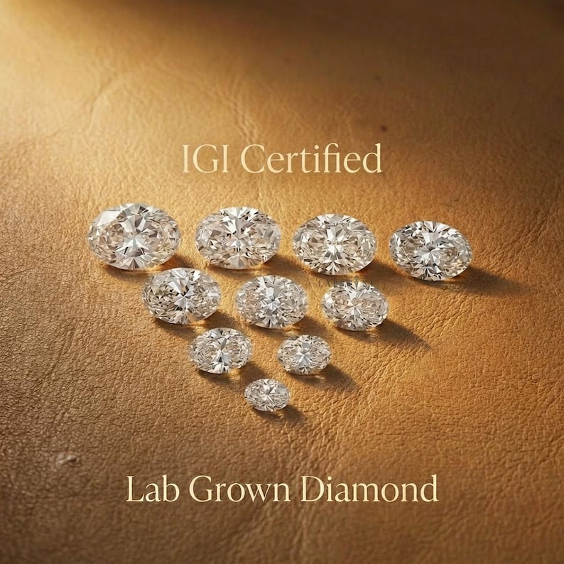 Oval cut lab grown diamond held with tweezers, close up diamond inspection for custom engagement ring, loose oval diamond showcasing brilliance and symmetry for fine jewelry design