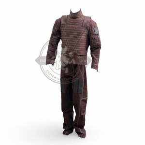 May include: A maroon costume with a high collar, long sleeves, and matching trousers. The outfit features horizontal stitching and black patches on the shoulders and legs. The costume is designed for cosplay or theatrical use.