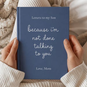 May include: A blue hardcover journal with white text that reads Letters to my Son, because i'm not done talking to you, and Love, Mom. The book features a clean, minimalist design with a matte finish and white lettering centered on the front cover.