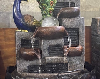 Peacock water fountain