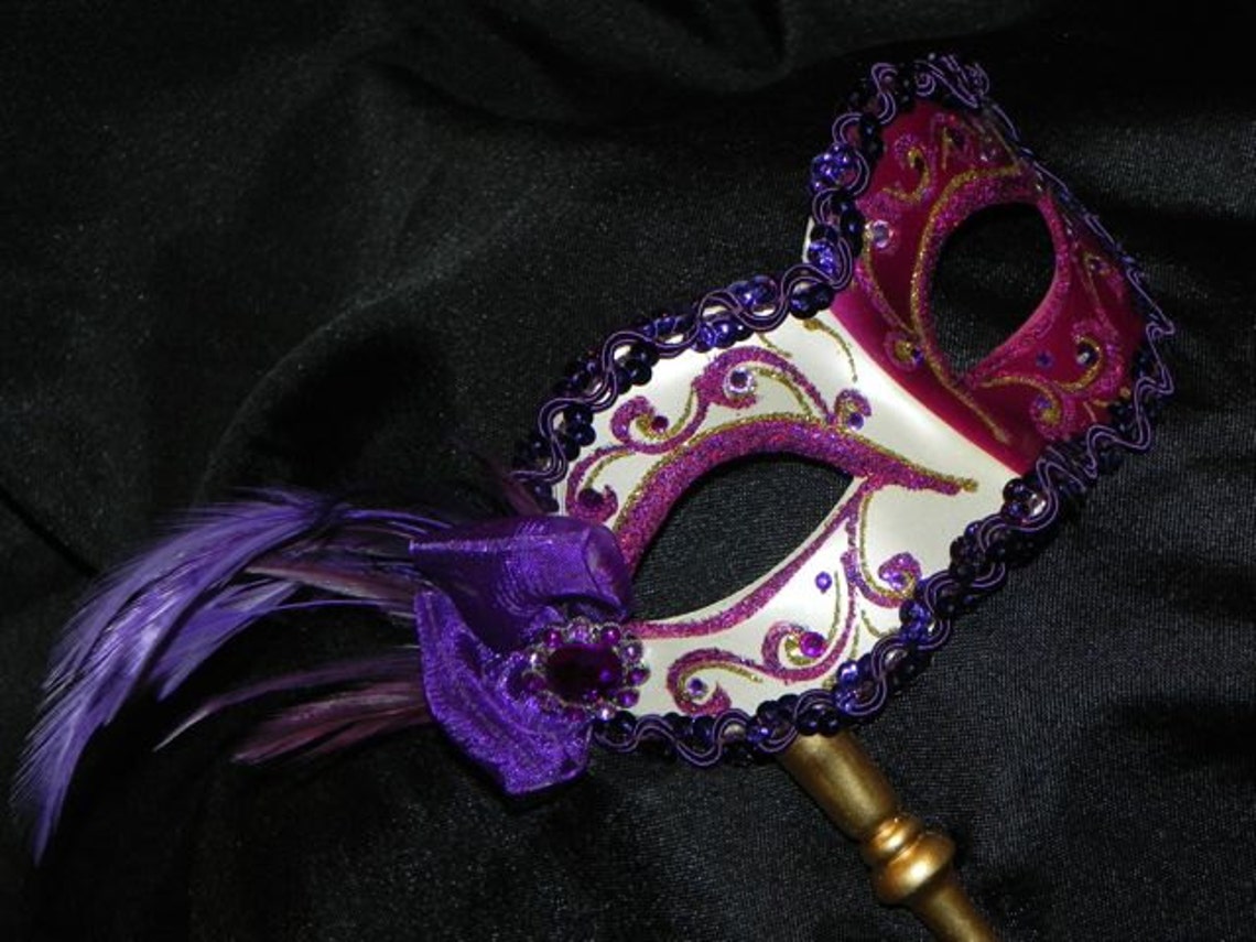 gold mardi gras mask purse