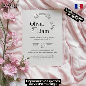 Peut inclure: Une invitation de mariage blanche avec les noms "Olivia & Liam" en écriture élégante. L'invitation comprend la date "25 Juillet 2026" et du texte en français. Le fond est un tissu rose clair avec des fleurs roses.