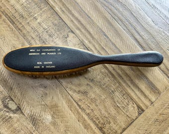 Vintage  Anderson and McAuley leather and wooden Clothes Brush c1970s