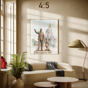 May include: A framed print featuring a watercolor illustration of Walt Disney and Mickey Mouse in front of Cinderella's castle. The print is displayed above a beige sofa with two round coffee tables. The text "4:5" is above the print.