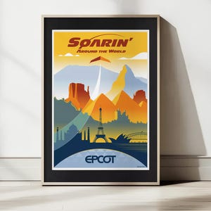 May include: Framed travel poster with the words "Soarin' Around the World" in yellow and a stylized landscape featuring the Eiffel Tower, Sydney Opera House, and other landmarks. The poster is in a black frame.