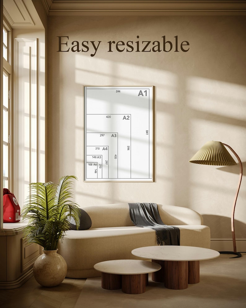 May include: A living room scene with a beige sofa, two round coffee tables, and a framed print. The print displays various paper sizes, including A1, A2, A3, A4, A5, and A6, with the text "Easy resizable" above it.