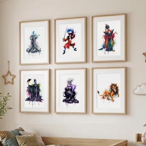 May include: Six framed watercolor prints featuring Disney villains. The artwork includes Hades, Captain Hook, Jafar, Maleficent, Ursula, and Scar. Each print has a white background and a wooden frame, with colorful paint splatters.