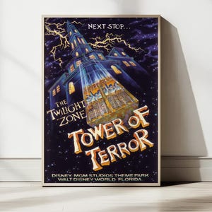 May include: A rectangular poster featuring a dark purple night sky with yellow lightning bolts behind a tall, illuminated building. The text reads NEXT STOP... THE TWILIGHT ZONE TOWER OF TERROR DISNEY MGM STUDIOS THEME PARK WALT DISNEY WORLD FLORIDA.