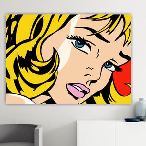 May include: A pop art style illustration of a woman with blonde hair and blue eyes. Her face is close-up and she is looking to the side. The background is yellow with a red accent.