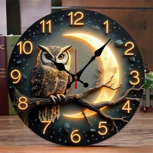 May include: Circular wall clock with an owl design, set against a night sky with a crescent moon. The clock has gold numerals, black hands, and an owl perched on a branch. The owl's feathers are brown and beige.