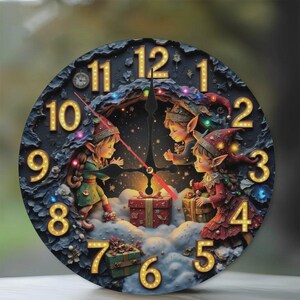 May include: Round wall clock featuring a whimsical design with three elves gathered around a gift. The clock face is dark blue with illuminated gold numbers and hands. The elves are wearing festive outfits, and the clock has a decorative border.